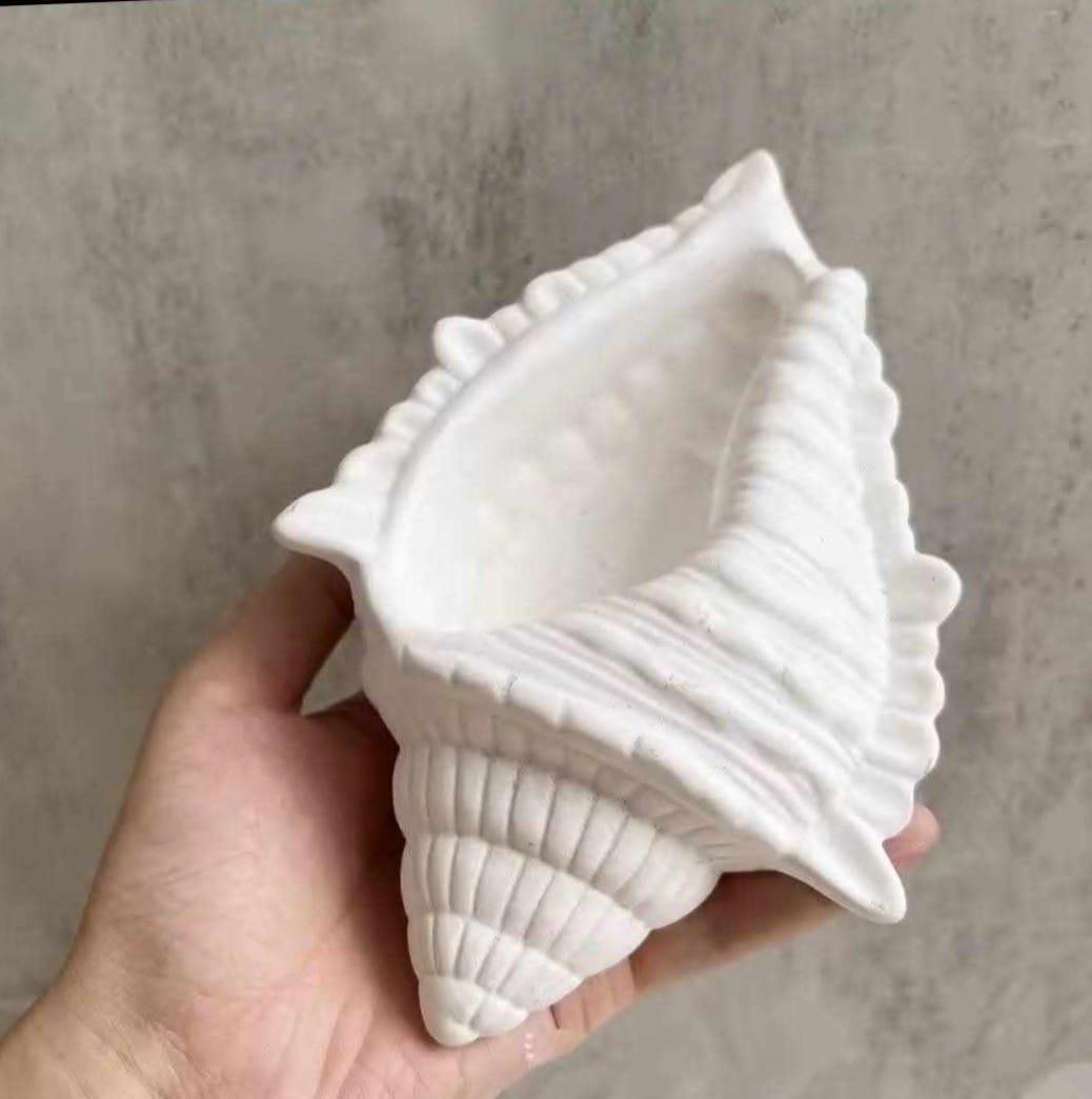 macetero forma de caracola de yeso